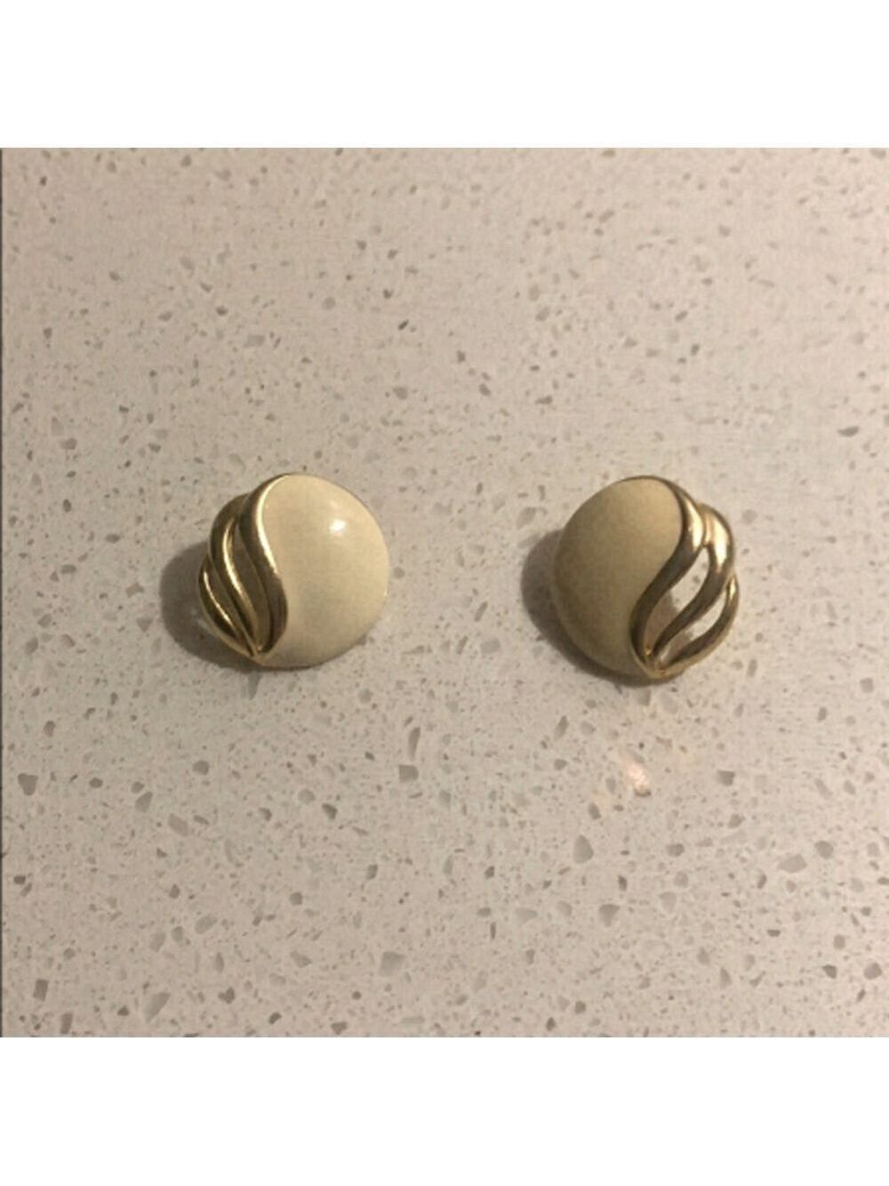 Vintage cream and gold earrings.